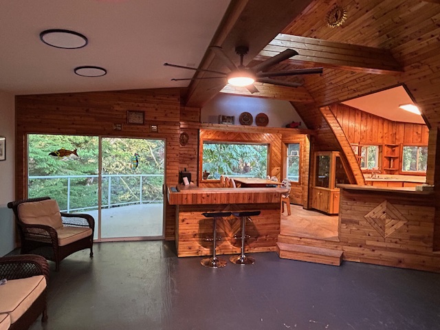 https://realestate.haidagwaiitrader.com/wp-content/uploads/Copy-of-Open-Concept-Cabin-Kitchen-and-Lounge.jpg