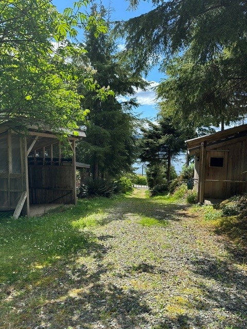 https://realestate.haidagwaiitrader.com/wp-content/uploads/Side-Yard.jpg